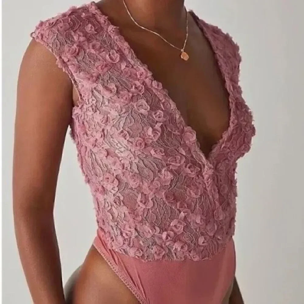 Free people - 2 hot 2 handle pink bodysuit size Medium